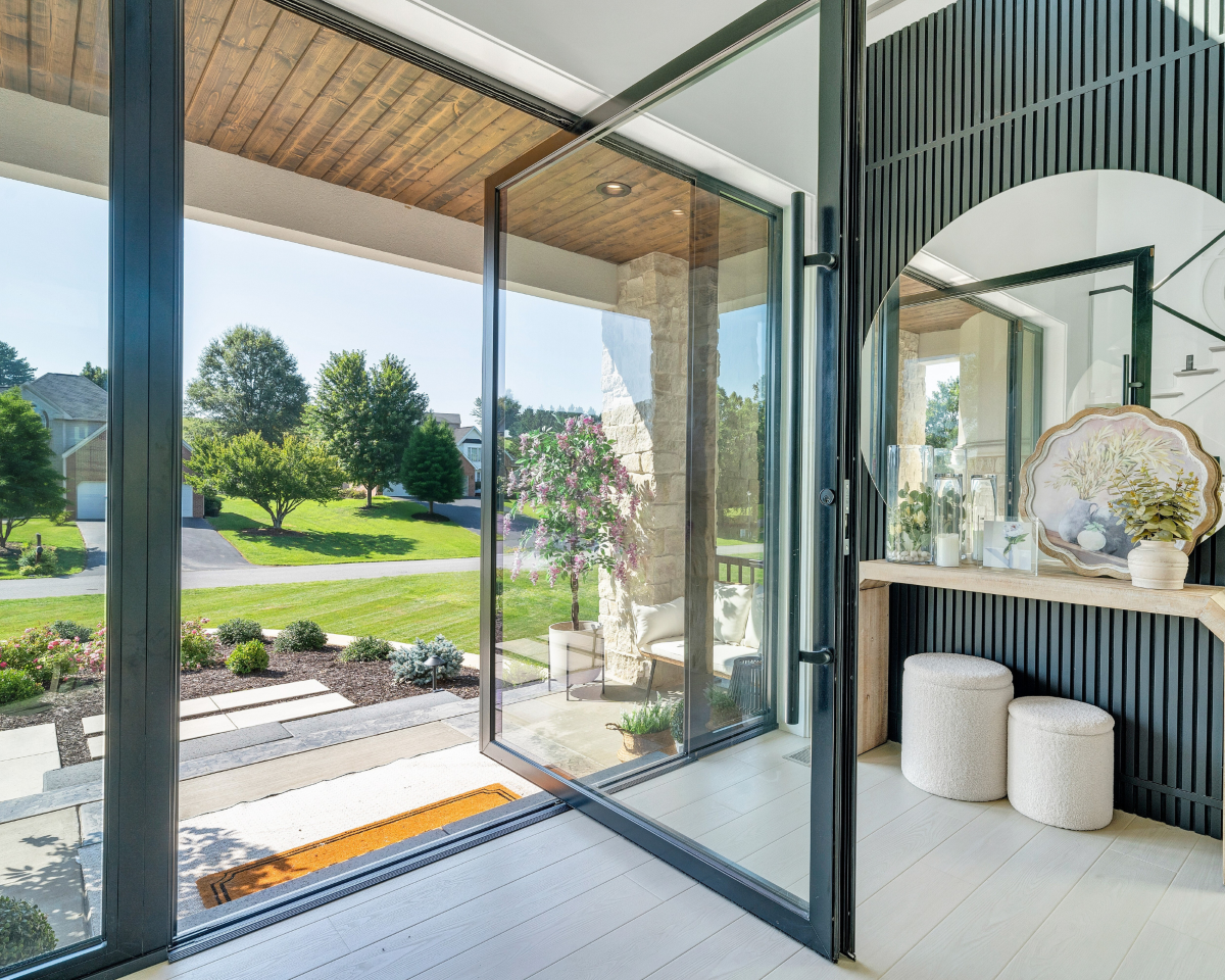 over-sized glass pivot door