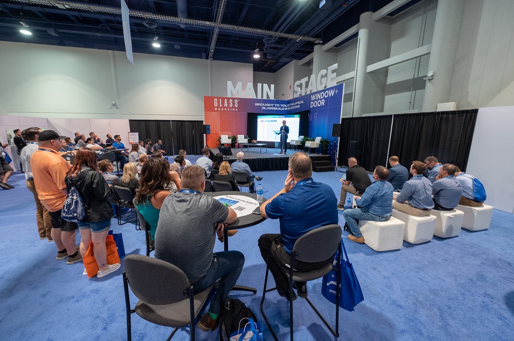 Connor Lokar speaks to GlassBuild attendees